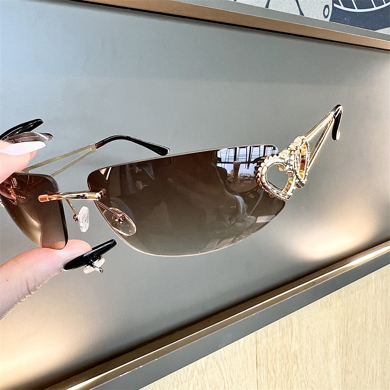 Sunglasses Cat Eye - Neue ovale, rahmenlose Cat-Eye-Sonnenbrille mit herzförmigem